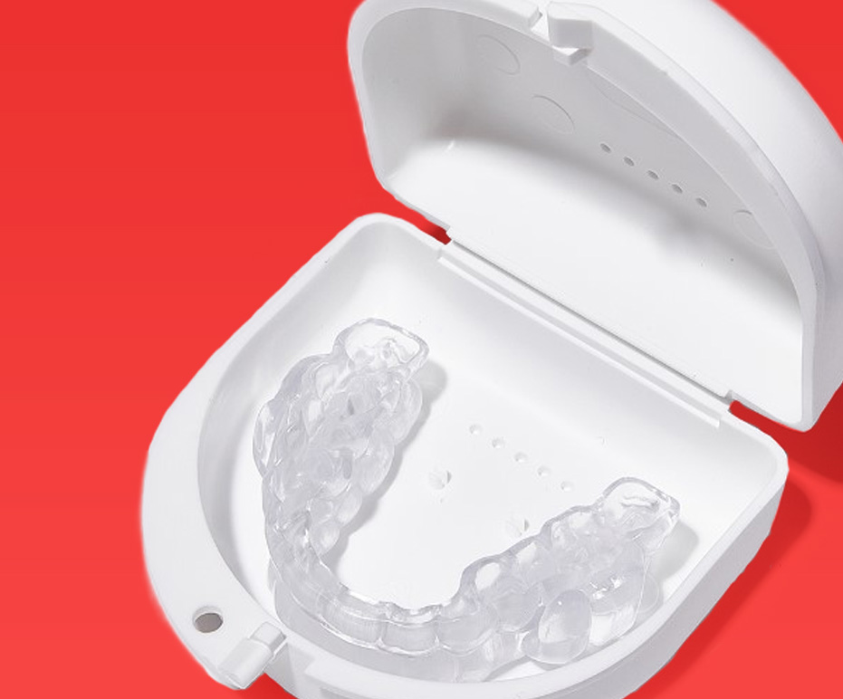 ProSomnus Oral Appliance in a White Carrying Case on a Red Background - 931x772